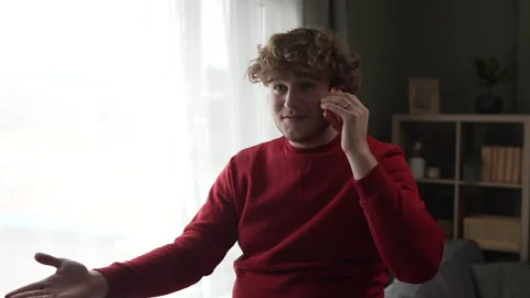 Stressed young man arguing on phone call Stock Footage 332430863