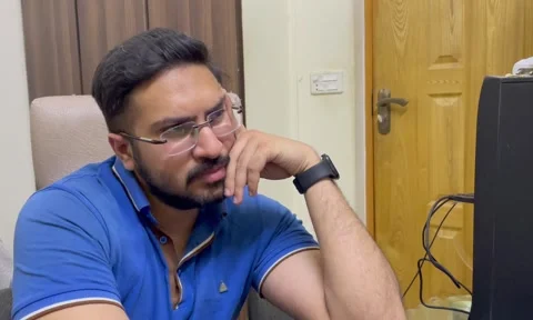 Stressed young man in glasses suffering from muscles tension, having painful  Stock Footage 241446315