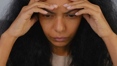 Stressing young female looking into computer screen for problem solution Stock Footage 201208229