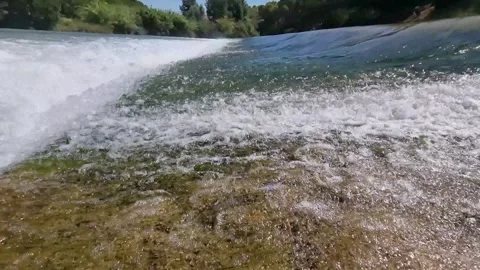 Stretch of current in the river Stock Footage 332794399