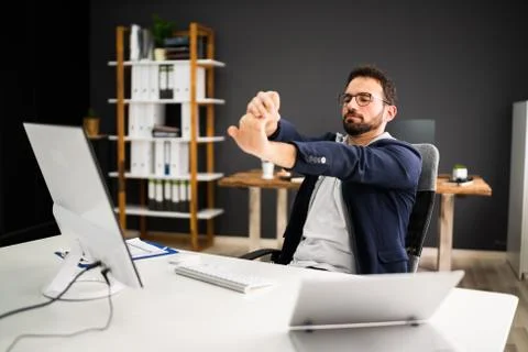 Stretch Exercise At Office Stretches While Sitting Stock Photos