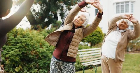 Stretch, instructor or old people in backyard with fitness class, wellness .. Stock Photos