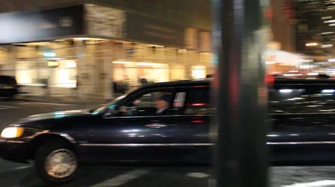 Stretch Limo Makes a Turn Stock Footage 56914224