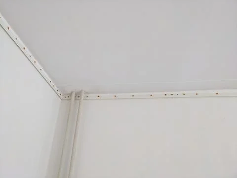 Stretch a white ceiling install in a room Stock Photos