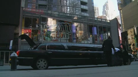 Stretched Limo in Business district, NYC Stock Footage