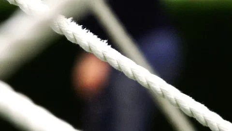 Stretched white thick rope ropes on a black blurred background. Stock Footage 77477335