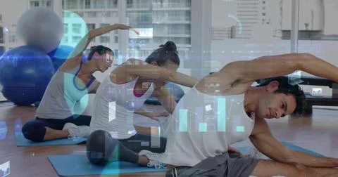 Stretching adults doing side bends on blue mats in gym with stability balls, Stock Photos