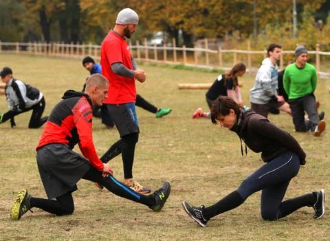 Stretching after a workout. Stock Photos