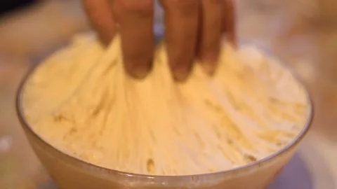 Stretching the dough 4K Stock Footage 101137826