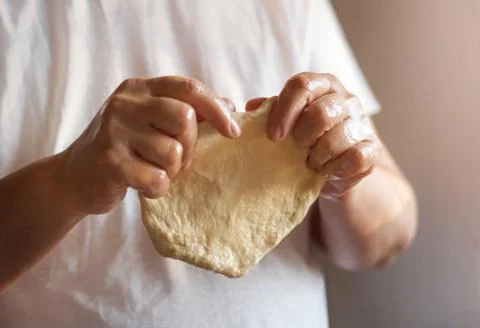 Stretching the dough Stock Photos