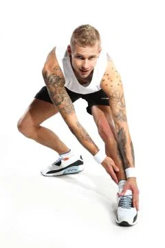 Stretching exercises on the mat  Stock Photos