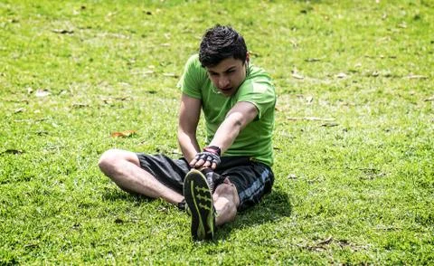 Stretching on the grass Stock Photos
