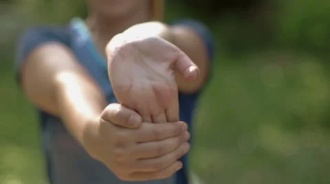 Stretching hands in nature Stock Footage 53643789