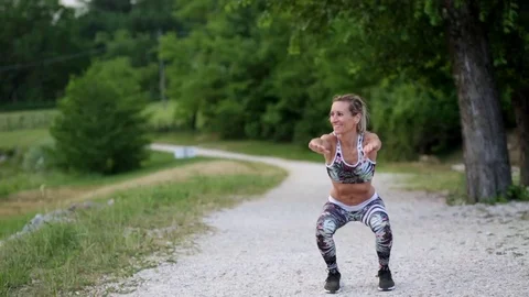 Stretching leg.Squat Stock Footage 111398618