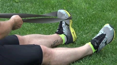 Stretching for a marathon run Stock Footage 139976514