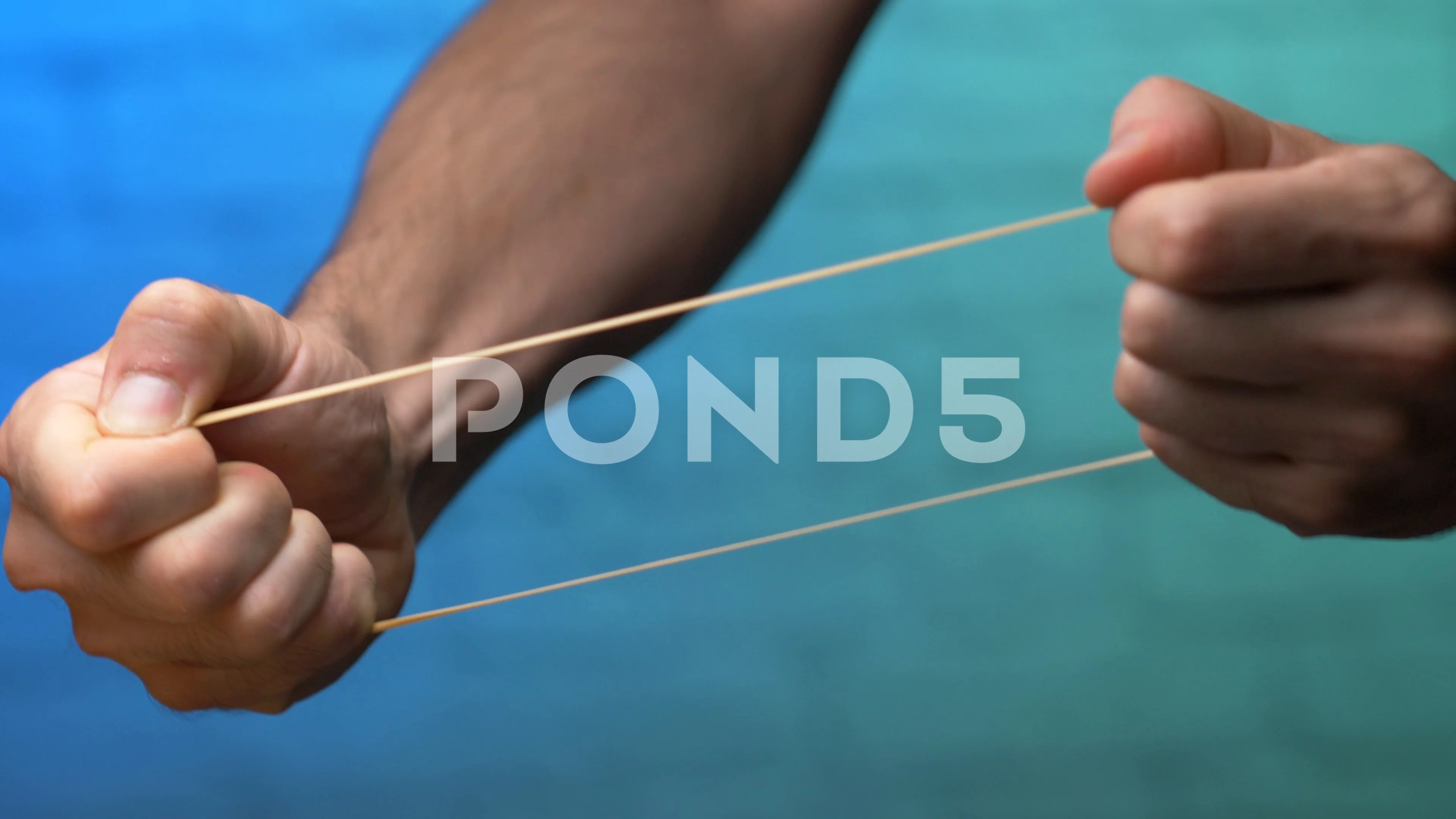Stretching a Rubber Band Elastic To its , Stock Video