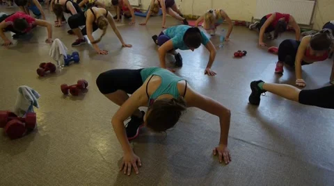 Stretching with slopes in gym Stockbeeldmateriaal 51070402