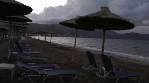 Strew umbrelas on the Greece beach Stock Footage 8990134