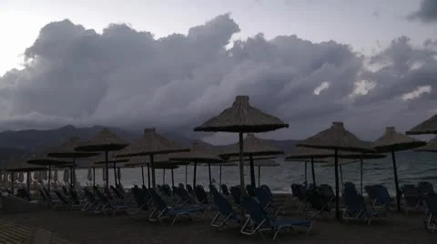 Strew umbrelas on the Greece beach Stock Footage 8990137