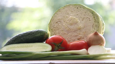 Strew the vitamins in fresh vegetables. Video stock 51638542