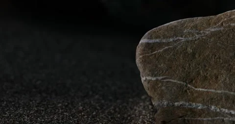 Striated Stone Standing on Sandy Ground. Stock Footage 273572106
