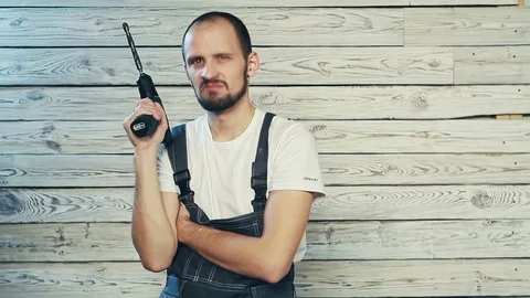 Strict Builder with screwdriver Stock Footage 82973767