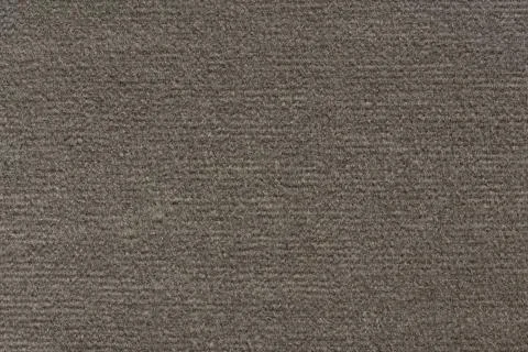 Strict deep grey textile background on macro. Stock Photos