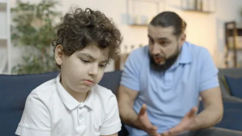 Strict father scolding son, criticizing sad little boy for mistake, parenting Video stock 152464540