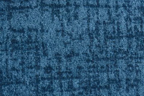 Strict textile background in blue colour. Stock Photos