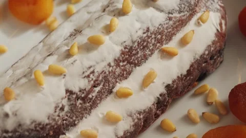 Striezel or Stollen close up footage. A traditional German Christmas pastry made Stock Footage 314231950