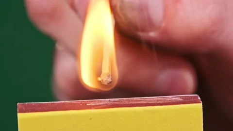 Strike a Match on a Matchbox in Slow Motion Stock Footage 263964605