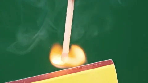 Strike a Match on a Matchbox in Slow Motion Stock Footage 264809690