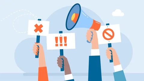 Strike, revolution, conflict. Protest with protesters hands holding megaphone Stock Footage 292427315