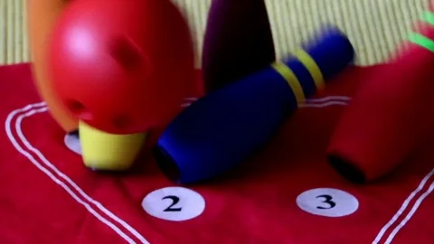 "Strike" on Toy Bowling Pins Stock Footage 76738344