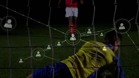Striker kicking ball outside box seeking goal, GK diving saving, tech network Stock Footage 332937670