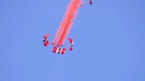 Striking aerial display of Red Devil military parachute team performing Video stock 285763581