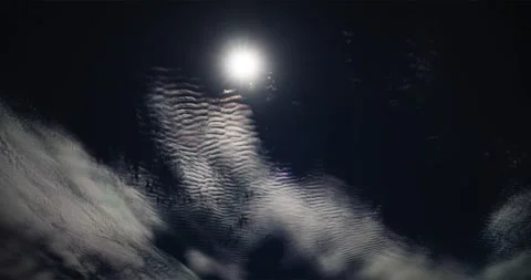 Striking cirrocumulus clouds join the sun on a summer day. Stock Footage 339515569