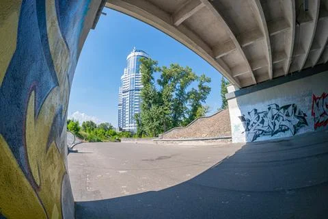 A striking image with forced perspective showcasing vibrant graffiti, an aban Foto stock