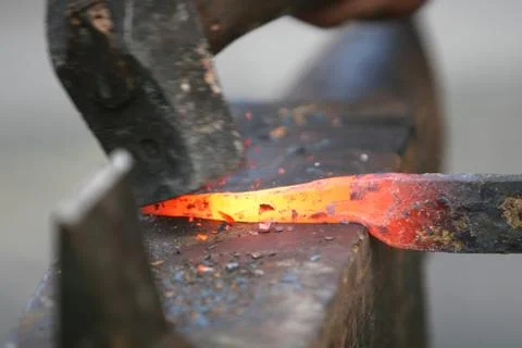 Striking it hot Stock Photos