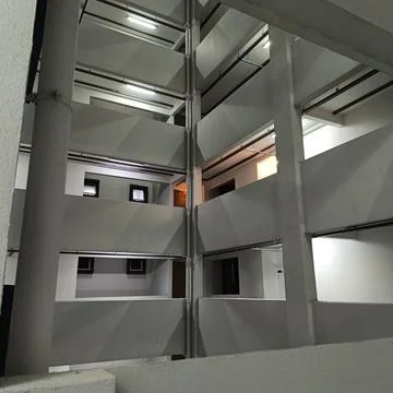 A striking low-angle shot of a modern apartment Stock Photos