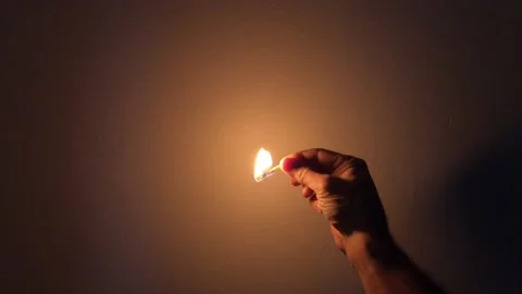 Striking a match Stock Footage 121907528