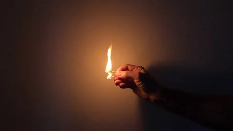 Striking a match Stock Footage 121907545