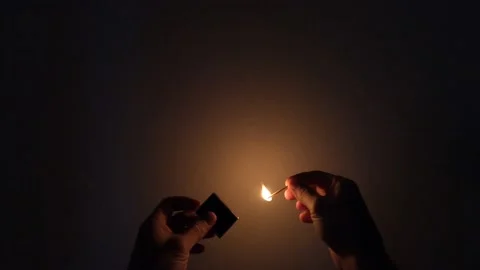 Striking a match Stock Footage 121908907