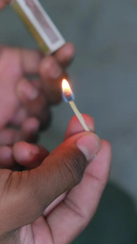 Striking Matchstick to Ignite Flame Close Up Video stock 332655212