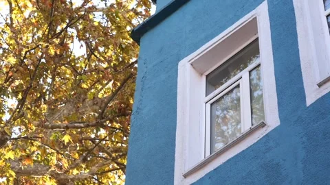 A striking Modern Blue Building featuring Bright Window Framing elements Stock Footage 294863606