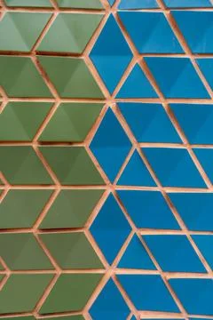 Striking pattern creating by meticulously arranged blue and green triangular 스톡 사진