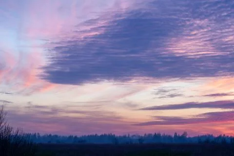 Striking Sunset Over Fields Stock Photos
