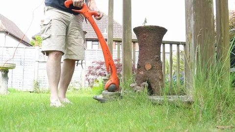 Strimming grass Stock Footage 90103064