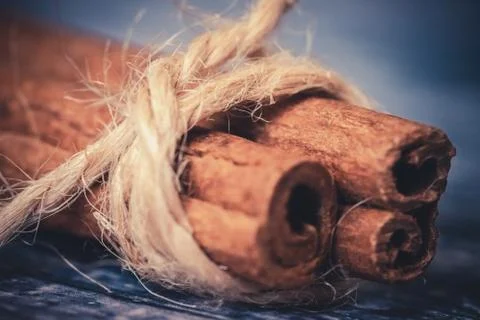 String around a cinnamon stick Stock Photos