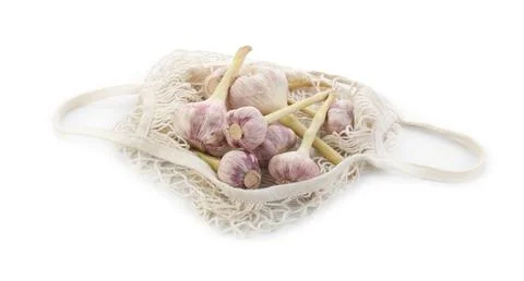 String bag with garlic isolated on white Stock Photos